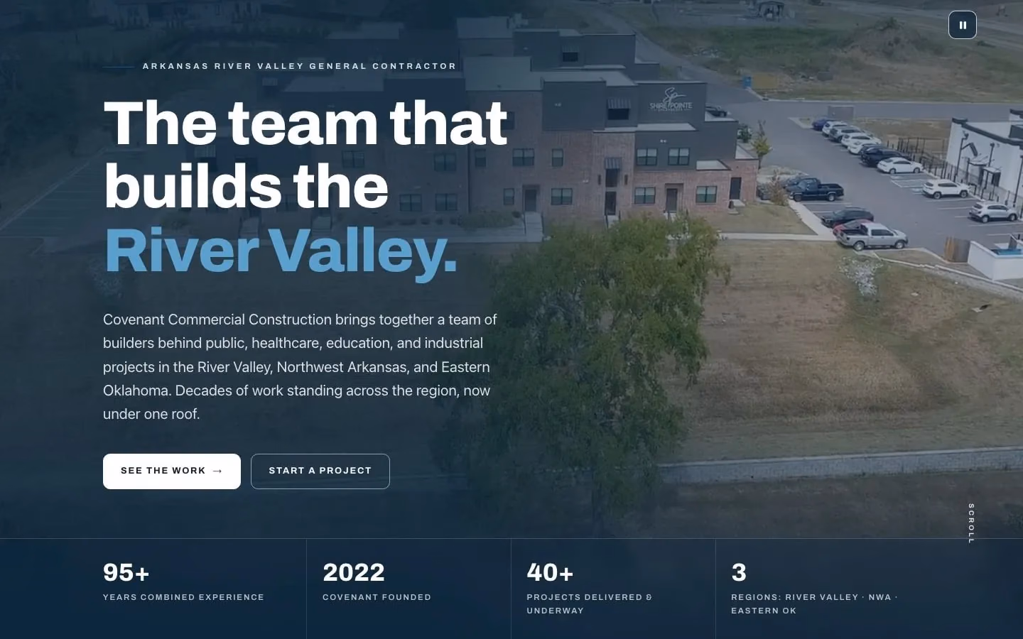 The Covenant Commercial Construction home page on a desktop: the hero over its aerial film, with its 4 numbers.